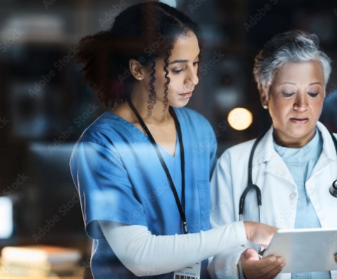 Why Healthcare Facilities Choose Valley City Linen female doctors reviewing a chart